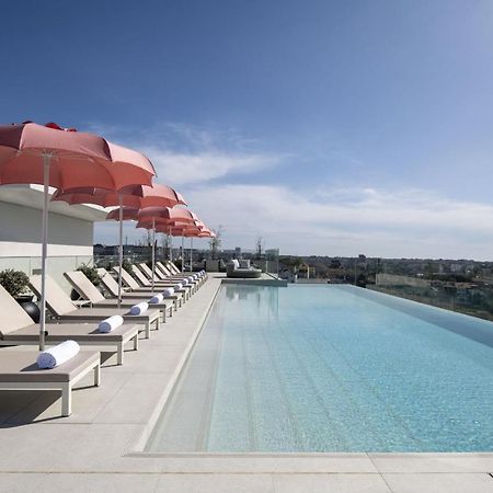 Renaissance Porto Lapa Hotel Exterior photo Rooftop pool